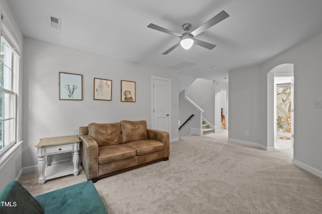 100 Redfoot Run Rd, Chapel Hill, NC 27516 - living area with arched walkways, a ceiling fan, carpet flooring, and stairway