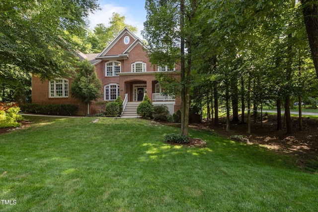 100 Redfoot Run Rd, Chapel Hill, NC 27516 - colonial home with brick siding and a front yard