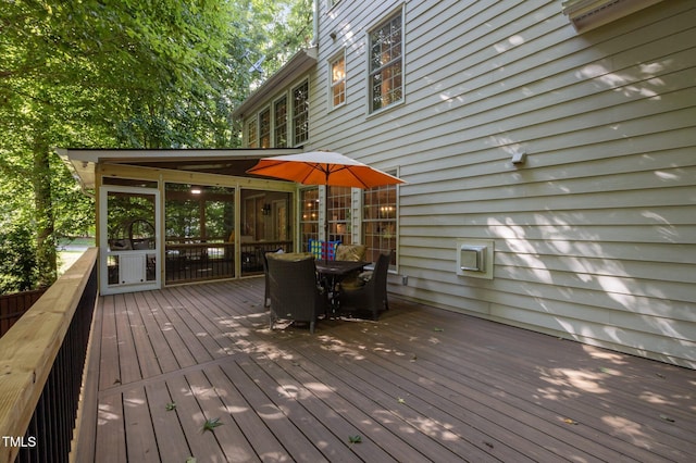 100 Redfoot Run Rd, Chapel Hill, NC 27516 - wooden deck featuring outdoor dining area and a sunroom