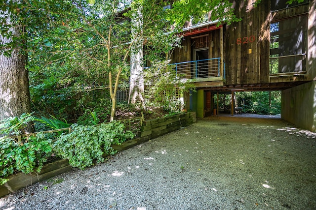 820 Runnymede Rd, Raleigh, NC 27607 - exterior space with driveway and a carport