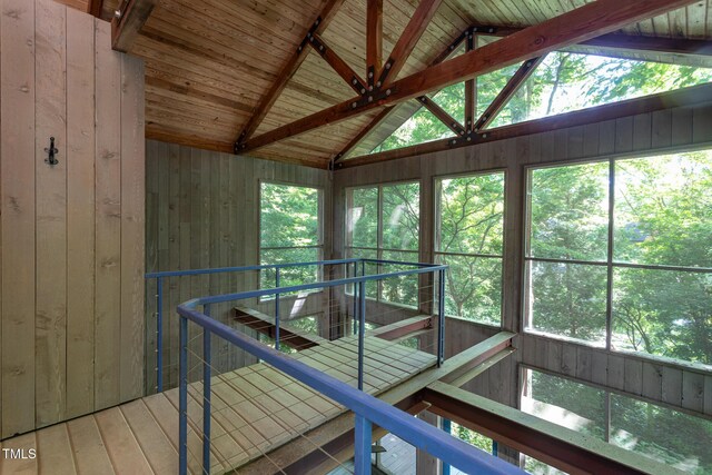 820 Runnymede Rd, Raleigh, NC 27607 - corridor with wooden walls and lofted ceiling