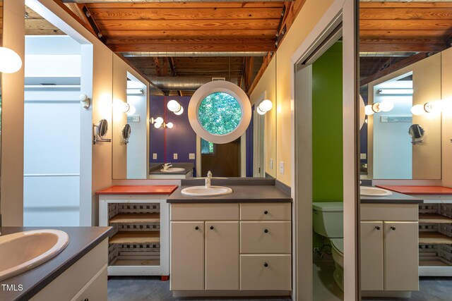 820 Runnymede Rd, Raleigh, NC 27607 - full bathroom featuring two vanities