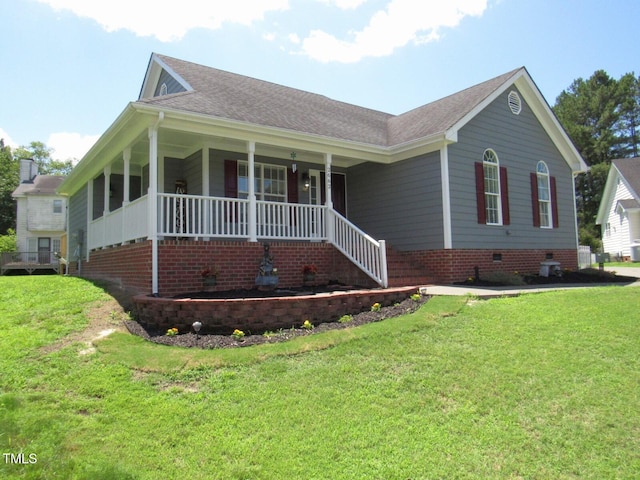 2662 Walas Ct, Creedmoor, NC 27522 - ranch-style home with a porch, a front lawn, crawl space, and a shingled roof