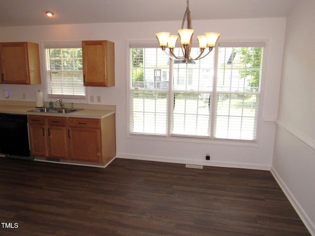 2662 Walas Ct, Creedmoor, NC 27522 - kitchen with black dishwasher, light countertops, a chandelier, dark wood-type flooring, and decorative light fixtures