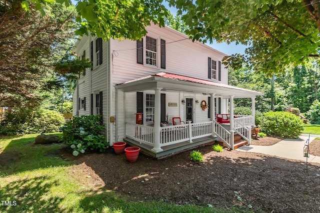 210 Peachtree St, Roxboro, NC 27573 - view of front of home featuring a porch