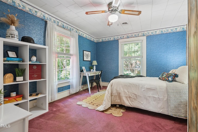 210 Peachtree St, Roxboro, NC 27573 - bedroom featuring multiple windows, carpet floors, and a ceiling fan