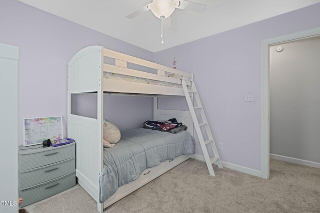 2925 Dargan Hills Dr, Wake Forest, NC 27587 - carpeted bedroom featuring a ceiling fan and baseboards