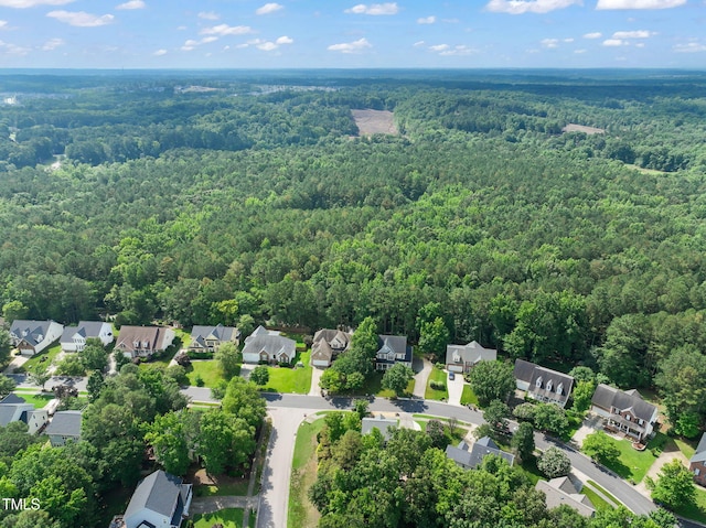 2925 Dargan Hills Dr, Wake Forest, NC 27587 - aerial perspective of suburban area with a heavily wooded area
