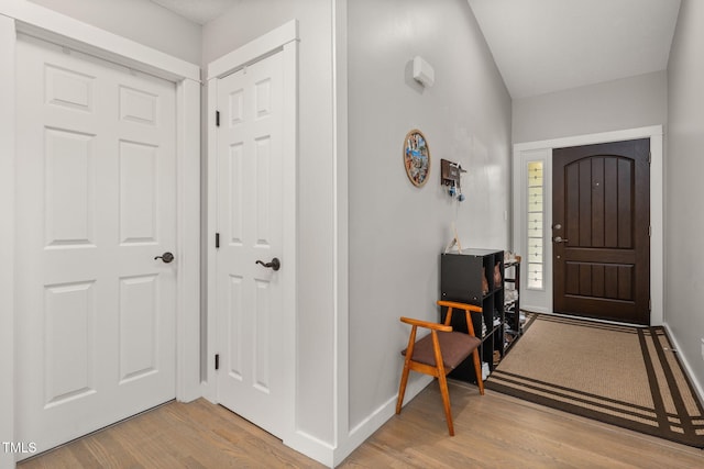 6205 Houndsman Ct, Raleigh, NC 27616 - entryway with light wood-type flooring and baseboards