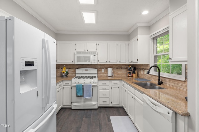 6205 Houndsman Ct, Raleigh, NC 27616 - kitchen with white appliances, dark wood-style floors, white cabinetry, ornamental molding, and recessed lighting