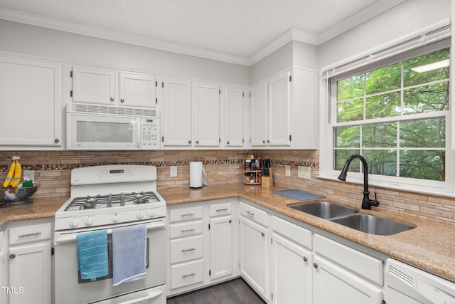 6205 Houndsman Ct, Raleigh, NC 27616 - kitchen with white appliances, ornamental molding, white cabinetry, backsplash, and dark wood-style floors