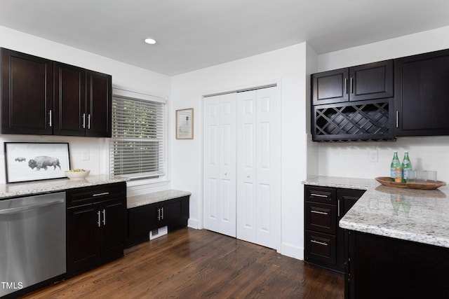 2801 E Shoreham St, Durham, NC 27707 - kitchen with stainless steel dishwasher, decorative backsplash, dark wood-style flooring, light stone countertops, and recessed lighting