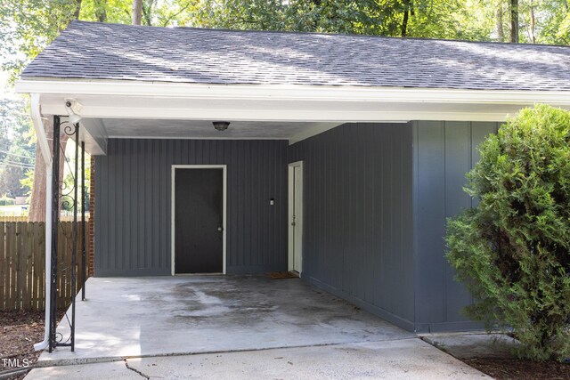 2801 E Shoreham St, Durham, NC 27707 - property entrance with a shingled roof