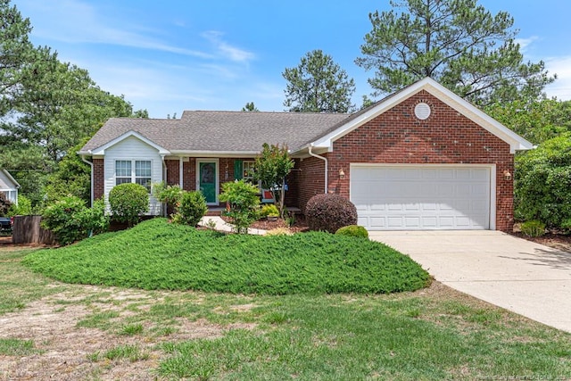 2 Beryl Cir, Pinehurst, NC 28374 - ranch-style house featuring brick siding, a garage, driveway, and a front lawn