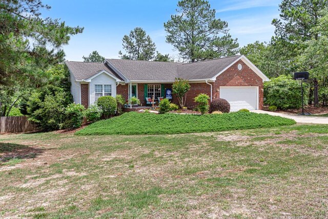 2 Beryl Cir, Pinehurst, NC 28374 - ranch-style house with a garage, brick siding, and concrete driveway