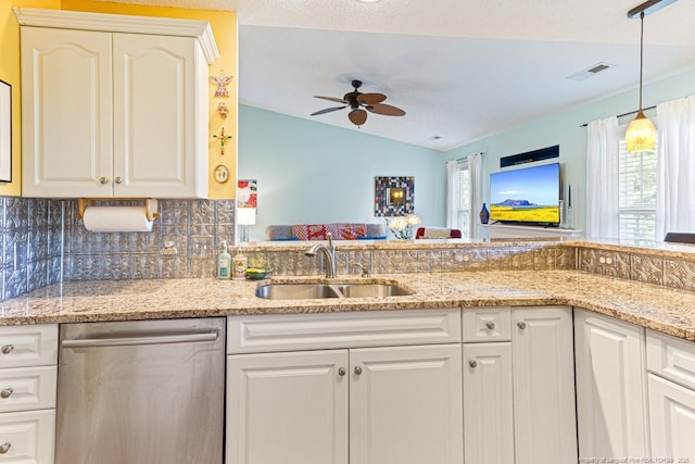 2 Beryl Cir, Pinehurst, NC 28374 - kitchen featuring dishwasher, lofted ceiling, a ceiling fan, tasteful backsplash, and light stone counters