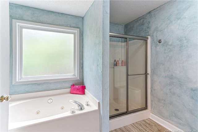 2 Beryl Cir, Pinehurst, NC 28374 - full bath with a stall shower, a tub with jets, a textured ceiling, and wood finished floors