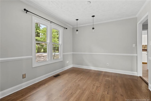 4304 Ferncreek Dr, Fayetteville, NC 28314 - unfurnished room featuring wood finished floors, a textured ceiling, and crown molding
