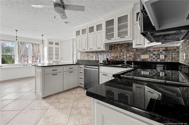 4304 Ferncreek Dr, Fayetteville, NC 28314 - kitchen with dishwasher, a peninsula, extractor fan, backsplash, and a textured ceiling