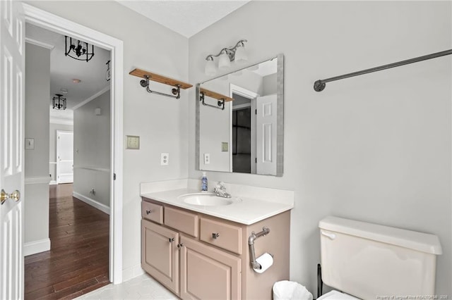 4304 Ferncreek Dr, Fayetteville, NC 28314 - half bathroom with vanity and wood finished floors