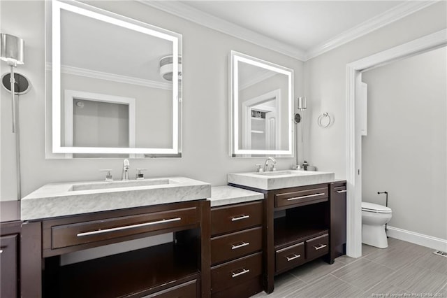 4304 Ferncreek Dr, Fayetteville, NC 28314 - bathroom featuring two vanities and ornamental molding