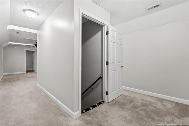 4304 Ferncreek Dr, Fayetteville, NC 28314 - hall featuring an upstairs landing, carpet floors, and vaulted ceiling