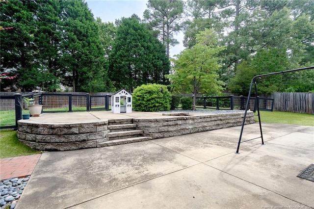 4304 Ferncreek Dr, Fayetteville, NC 28314 - surrounding community featuring a patio area and view of scattered trees