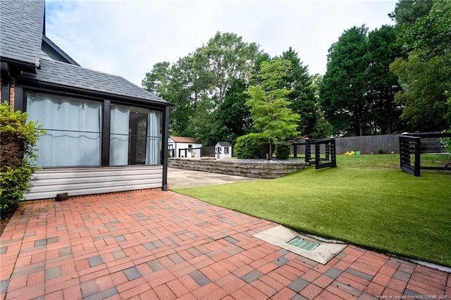 4304 Ferncreek Dr, Fayetteville, NC 28314 - view of patio / terrace featuring a shed