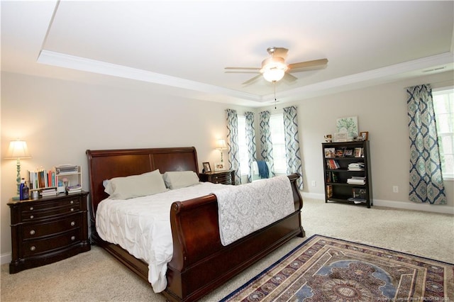 435 Lancaster Dr, Vass, NC 28394 - bedroom with a raised ceiling, light colored carpet, ornamental molding, and a ceiling fan