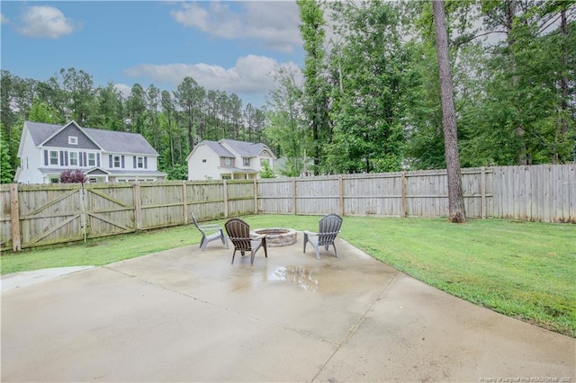 435 Lancaster Dr, Vass, NC 28394 - fenced backyard with a fire pit and a patio