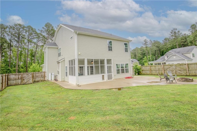 435 Lancaster Dr, Vass, NC 28394 - back of house with a fire pit, a patio, and a fenced backyard