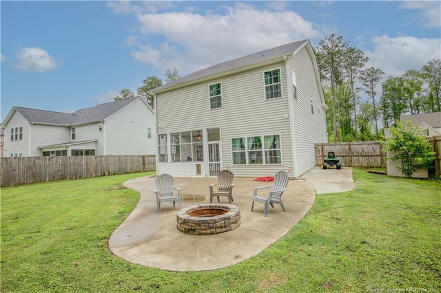 435 Lancaster Dr, Vass, NC 28394 - back of property with a patio area, an outdoor fire pit, a fenced backyard, and a sunroom