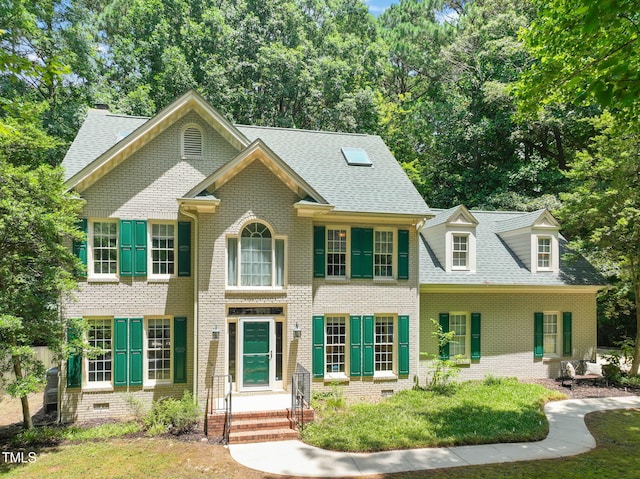 2401 Worthing Ct, Wake Forest, NC 27587 - view of front facade featuring brick siding and roof with shingles