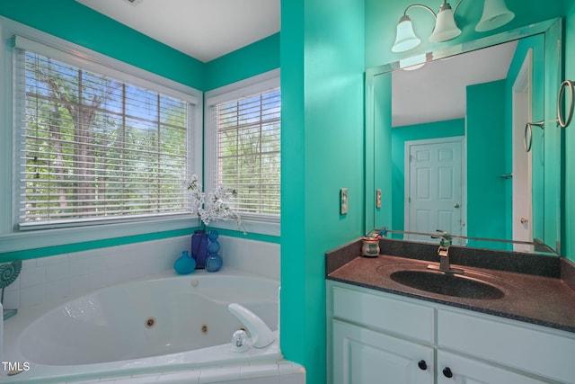2401 Worthing Ct, Wake Forest, NC 27587 - bathroom featuring a whirlpool tub and vanity