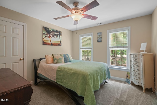 2401 Worthing Ct, Wake Forest, NC 27587 - carpeted bedroom with baseboards and ceiling fan