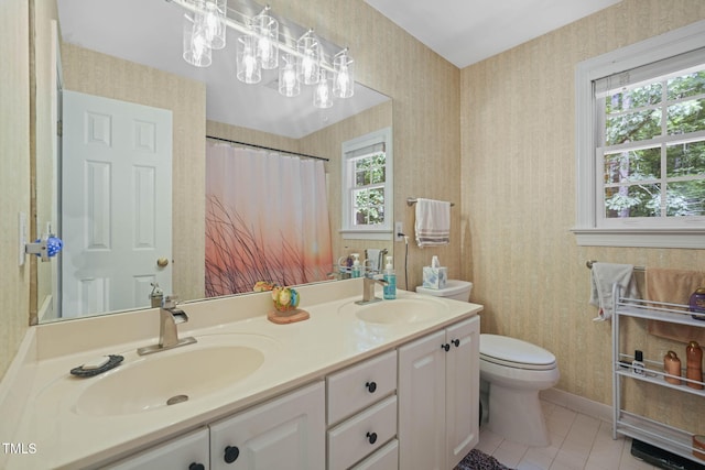 2401 Worthing Ct, Wake Forest, NC 27587 - bathroom with wallpapered walls, double vanity, tile patterned floors, and a shower with shower curtain