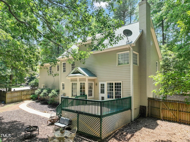 2401 Worthing Ct, Wake Forest, NC 27587 - rear view of property with a deck and a chimney