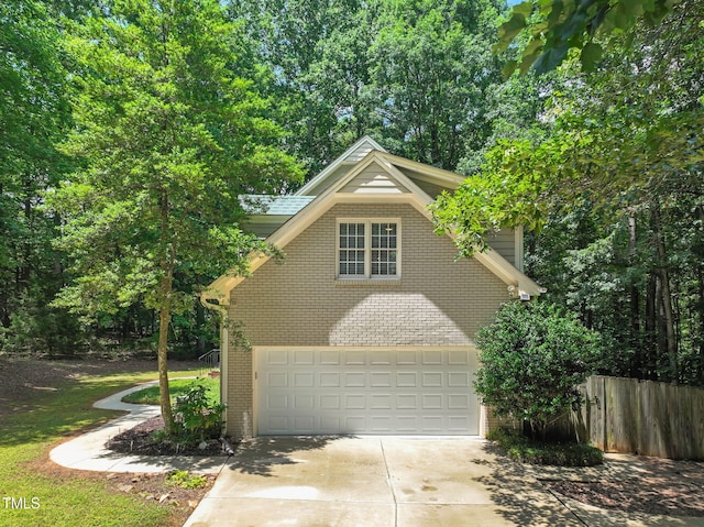 2401 Worthing Ct, Wake Forest, NC 27587 - view of side of home with brick siding, driveway, and a garage