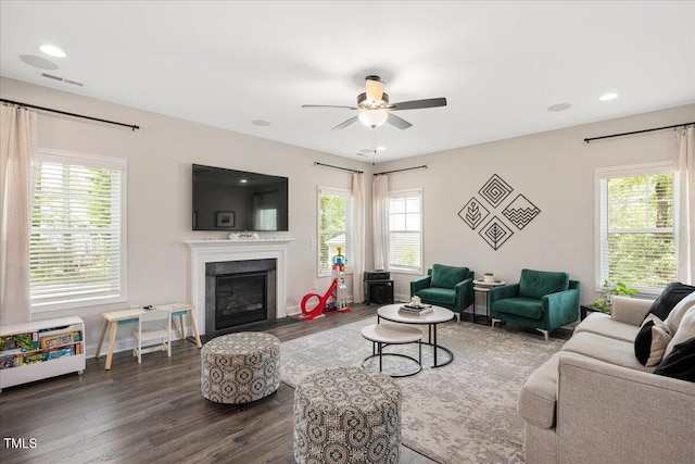 103 Foothill Ct, Sanford, NC 27330 - living area featuring dark wood-style floors, healthy amount of natural light, ceiling fan, a fireplace with flush hearth, and recessed lighting