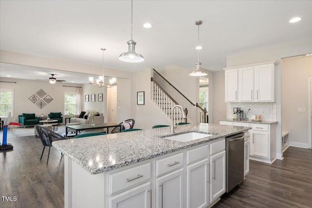 103 Foothill Ct, Sanford, NC 27330 - kitchen featuring dishwasher, dark wood-style flooring, open floor plan, ceiling fan, and backsplash