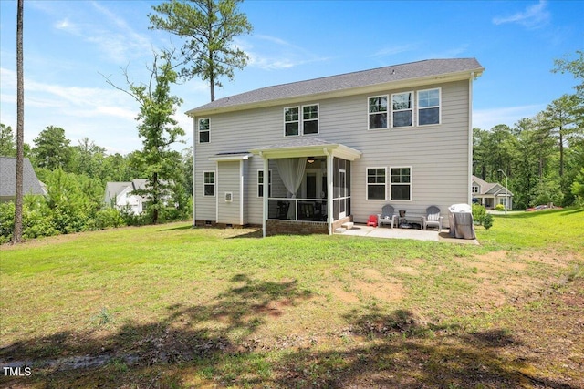 103 Foothill Ct, Sanford, NC 27330 - back of house featuring a patio, a sunroom, and a lawn