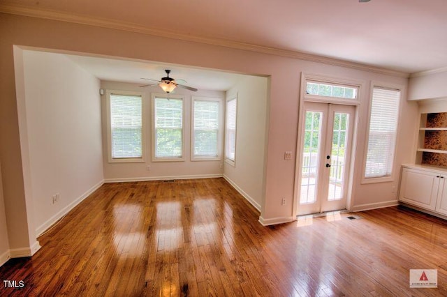 332 Bridgegate Dr, Cary, NC 27519 - entrance foyer with hardwood / wood-style floors, ornamental molding, a ceiling fan, and french doors