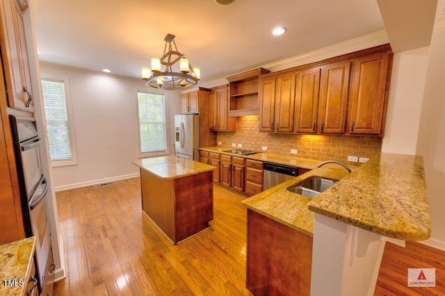 332 Bridgegate Dr, Cary, NC 27519 - kitchen with appliances with stainless steel finishes, a peninsula, open shelves, light stone countertops, and recessed lighting