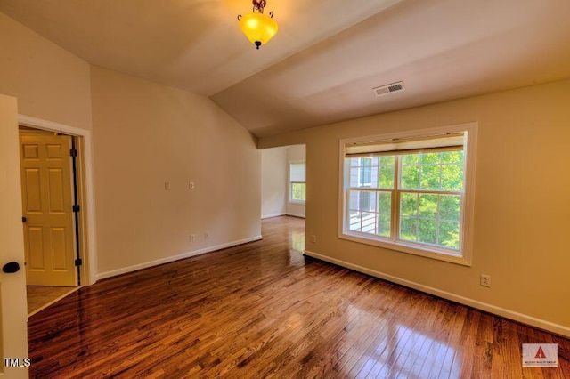332 Bridgegate Dr, Cary, NC 27519 - unfurnished room with wood finished floors and lofted ceiling