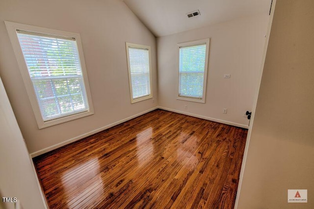 332 Bridgegate Dr, Cary, NC 27519 - unfurnished room with plenty of natural light, vaulted ceiling, and wood finished floors