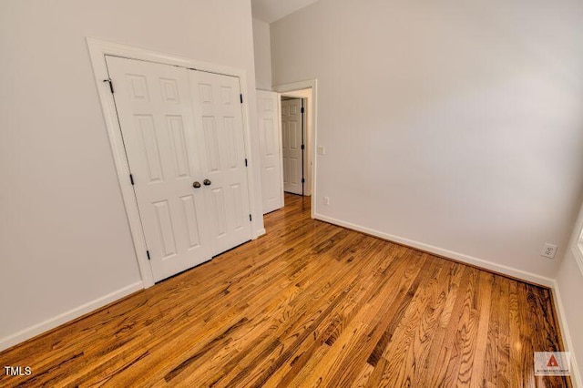332 Bridgegate Dr, Cary, NC 27519 - unfurnished bedroom featuring light wood-style floors and a closet