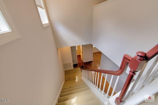 332 Bridgegate Dr, Cary, NC 27519 - staircase with baseboards