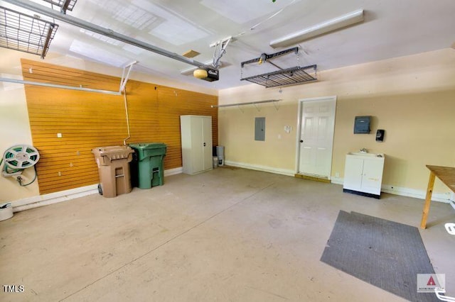 332 Bridgegate Dr, Cary, NC 27519 - garage with electric panel, a garage door opener, and wood walls
