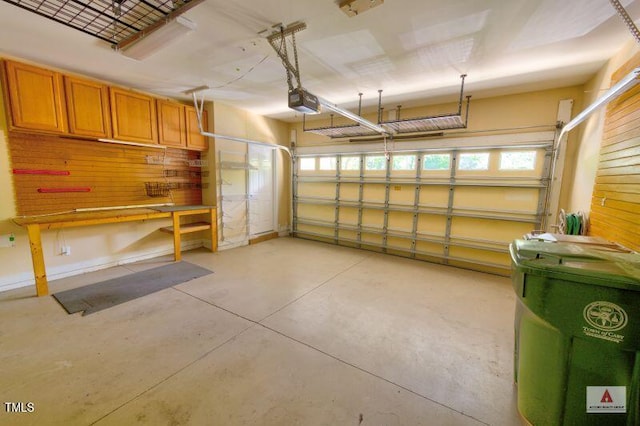 332 Bridgegate Dr, Cary, NC 27519 - garage featuring a workshop area and wooden walls