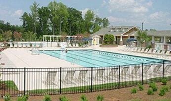 332 Bridgegate Dr, Cary, NC 27519 - community pool featuring a patio